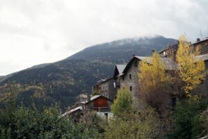 brown and gray concrete house on top of mountain